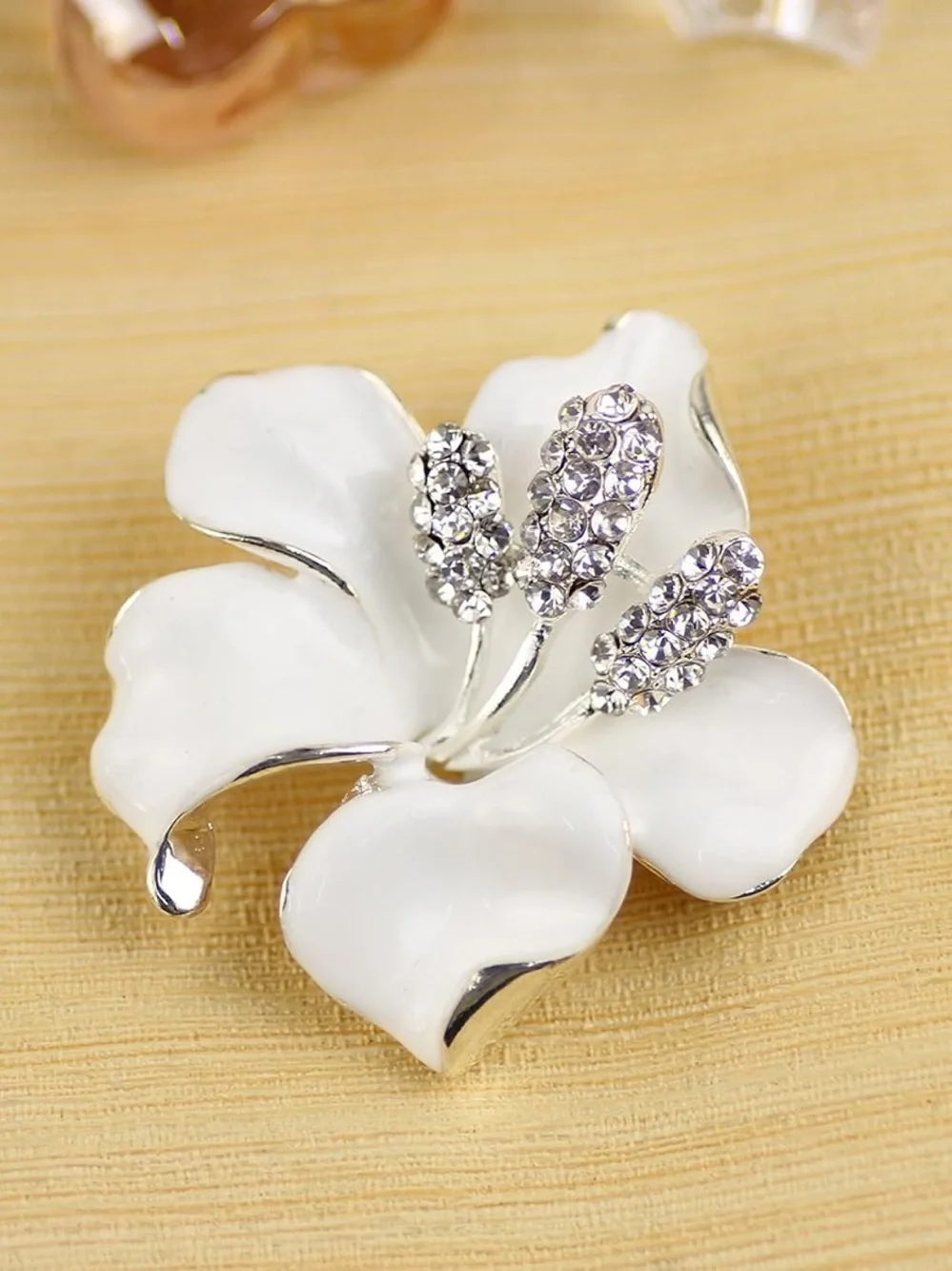 Anthropologie White Enamel Flower Brooch with Crystal Centers